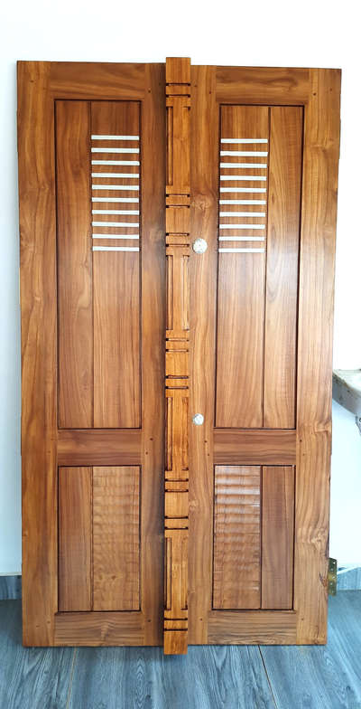 wooden double doors  #woodendoors  #FrontDoor  #Carpenter  #NEW_PATTERN  #newhome   #newhouse  #simpledesigns