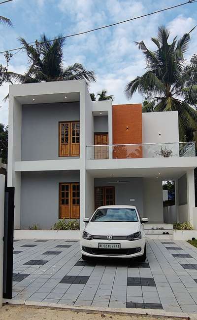1700/3bhk/Contemporary style
6 cent/double storey/Kollam

Project Name: 3bhk,Contemporary style house 
Storey: double
Total Area: 1700
Bed Room: 3bhk
Elevation Style: Contemporary
Location: Kollam
Completed Year: 

Cost: 80 lakh
Plot Size: 6 cent