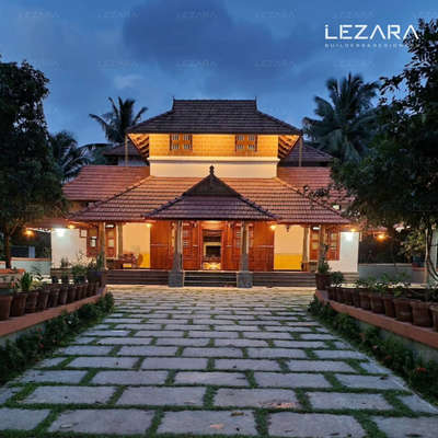 kerala traditional home project 

Client : Mr. Kesavan

Location : Pulpetta, Manjeri

NALUKETTU
Kerala architectural style characterized by its use of wood, traditional craftsmanship, and unique designs. The most notable feature is the prevalence of steeply sloping roofs, often thatched with tiles. Intricate wooden carvings, pillars, and verandas are also prominent elements, reflecting the rich cultural heritage of the region. Traditional homes, known as 'nalukettu', are typically built around a central courtyard, showcasing a harmonious blend of aesthetics, functionality, and climatic suitability.

For more  details contact
www.lezarabuilders.com
tolezara@gmail.com
+91 9388433499

.

.

.

.

.

.
#keralahomes #keralatourism #keralaattraction #keralaarchitecture #keralahomeinterior #laterite #brickwall #woodencarving #charupadi #thulasithara #nadumuttam #keralaresorts #keralagallery #keralagram #godsoncountry #keralavibes #malayalam #malayalamcinema #keralatradition #kerala #keralapho