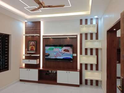 #Home interiors-Thiruvalla.
#T V unit.
#Prayer unit.
# Arc drive paneling.
# Gypsum ceiling.
# Modular kitchen.