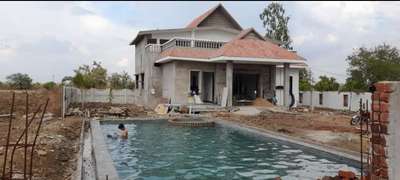 Farmhouse Construction With Swimming Pool  
#moderndesign  #swimmingpool  #HouseConstruction