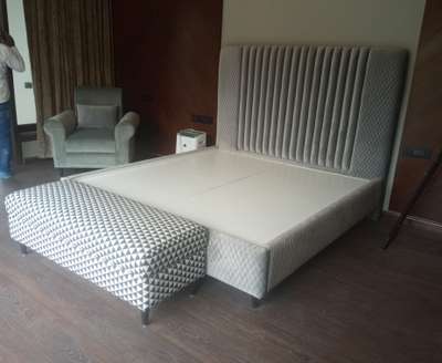 Master bed with chair