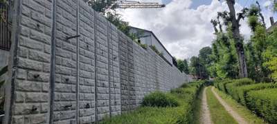 Retaining wall cum compound wall
