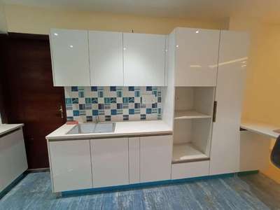 Narender Chauhan this side from Dezire Interiors.
We have our own manufacturing unit of Modular kitchen and wardrobe in sector 33 Gurugram.
Can i know your requirement ?
Contact. 7669900096