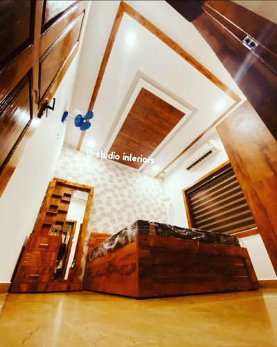 gypsm ceiling with wooden work

low budjet