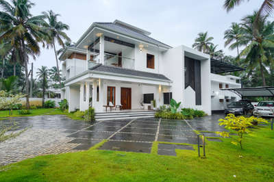Home that is modern inside out

‘Rithu’ is an apt name for Arun Vadanappilly’s home as it pass on the soothing vibe of seasons. This home has a beautiful interior as well as the exterior. Furniture are made to blend in with the interiors. Cots with headboard, tables and sofas that are contemporary - words fall short to describe the elegance of this home. A home to envy on with it’s simplicity!

Clients : Mr Arun
Location : Vadanappilly

Visualized & Executed by:
AMAC Architects, Interiors & Vasthu Consultants

amacindia@gmail.com
+91 86061 18882
amacarchitects.in

Anand Complex,Opp ICICI Bank, Thrissur, India, Kerala