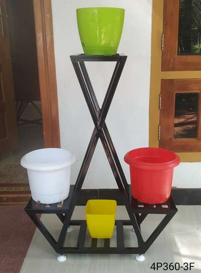 METAL STAND FOR INDOOR PLANTS.
 
Durable, Eco friendly. Rest free, Not harmful for any floor, Adjustable legs for leveling.