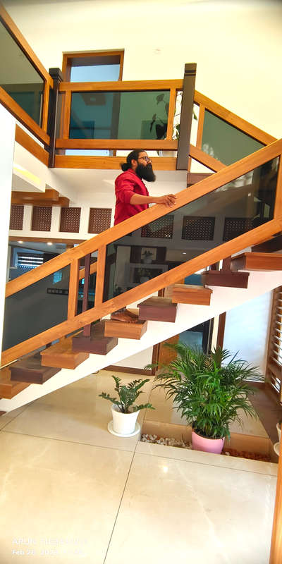 #stepdesign  #StaircaseDecors  #GlassHandRailStaircase  #StraightStaircase   #KeralaStyleHouse  #steps  #TeakWoodDoors  #WoodenStaircase
