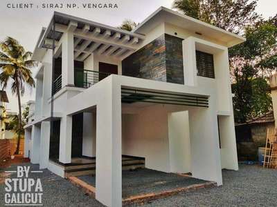 #stupacalicut #architecturedesigns #Architect #FlatRoofHouse #ContemporaryHouse #WallDesigns #claddingstone #PergolaDesigns #Malappuram #KeralaStyleHouse #godsowncountry
