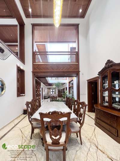 The residence  in Pavaratty, Kerala showcases classic luxury  within  its elegantly  exterior.
The client  wanted a classic elegant yet functional home where cross ventilation  and maintenance  of privacy were to play a vital role.The wooden interior  crafts a luxury look into the facade .While keeping things elegant,  simple,functional and practical .The interior injects enough style using handpicked  quality accessories. The piece of resistance is the flamboyantly designed  green courtyard that sits in the center of the house, illuminated  by the natural sunlight  received  from the overhead skylight. Some of the amenities  include  gazebo, patio, landscaping, interiors designed and advanced security installation. 

Area : 6500sqft
Client : Nisumon
Architect : Fairooz
Interior design and execution :  ECOSCAPE architecture interior innovation, Pavaratty 
Mob - 9633070602,7593911213



Please contact  us: Email: ecoscapepvt@gmail.com 
Follow us on 
Youtube : https://youtube.com/user/ju