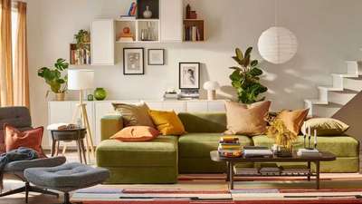 Warm colours always create a welcoming space. You can choose a green sofa in sap shades to bring out the warmth. Throw in a couple of cushions to make it comfortable with a globule lamp, Add some wall decor in simple frames with plants to finish the look.
#interior #decor #ideas #home #interiordesign #indian #colourful 
#decorshopping