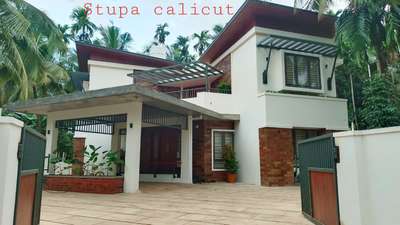 #stupacalicut #Architect #architecturedesigns #KeralaStyleHouse #exteriors #KeralaStyleHouse #moderndesign #stone_cladding #godsowncountry
