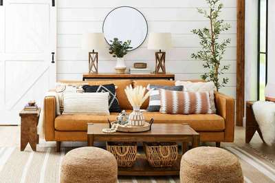 Get this rustic look with leather chairs, a round mirror and some rattan ottomans.
#interior #decor #ideas #home #interiordesign #indian #colourful 
#decorshopping