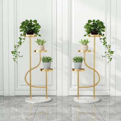 Elegant metal and marble planter ❤️
#planters #HomeDecor #homesweethome #InteriorDesigner #homeinteriordesign