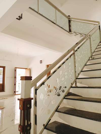 steel with glass stair handrail