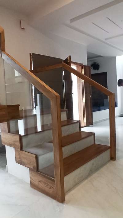 wood with glass handrails work...