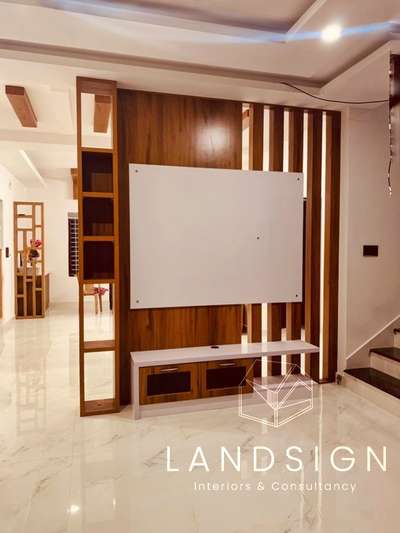 TV unit for a client Mr. Lijo #kottarakkara 
Follow us on Instagram:
https://www.instagram.com/landsign_interiors/ 

Facebook page:
https://www.facebook.com/LandsignInteriors/

Website:
http://www.landsigninteriors.com/

#houseplans #floorplans #2dplan #homeplans #2dview #3dview #homeinspo #homegoals #houserenovation #housedesign #homedesign #interiordesign #homedecor #interiordecor #interiorstyling #homegoals #houserenovation #housedesign #kitchendesign #kitchenrenovation #kitchen #kitchencabinets #kitchencabinetry #cabinetry #cabinetmaker #walldecor #wallunit #architecture #tvunit #homedesign #architecturedesign #renovation #luxuryhomes #customdesign #uniquedesign #keralahomedesigns