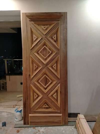 Wooden main Gate(door) of penthouse 
#woodengates #DoubleDoor #FrontDoor #gates #maingate #woodeninterior #woodeninteriordesign #Entrance