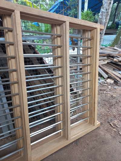 304 Grade Stainless Steel  (.5x.5inch ) square tube
ഫസ്റ്റ് ക്വാളിറ്റി ആഞ്ഞിലി തടിയിൽ ജനലുകളും.
മൂന്നു പാളി : 6750/- 
#Teak #anjily #plavu #WoodenWindows #woodendoors #window