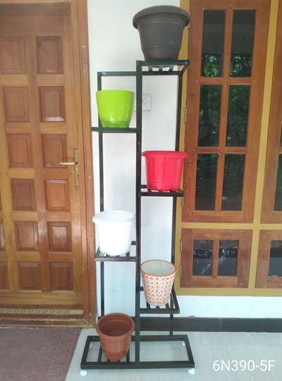METAL STAND FOR INDOOR PLANTS. 

Durable, Eco friendly. Rest free, Not harmful for any floor, Adjustable legs for leveling.