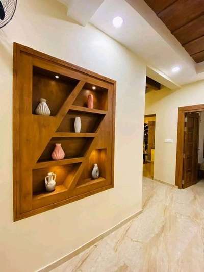 wall shelf design

#wallshelves
#homesweethome
#Architectural&Interior
#interiordesignkerala
#HouseDesigns