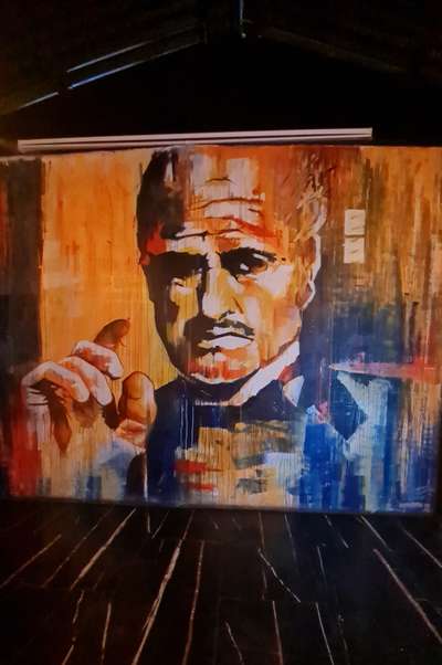 so once I was traveling in jodhpur rajasthan I saw big portraits made on city walls. it looked beautiful to me so I got up with this design Idea in my design at a City bar cafe.
#cafedesign #cafeteria #InteriorDesigner #cafeinteriors #gangstertheme #godfather #potrait