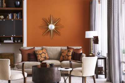 This space with sienna shade plays beautifully with the golden and brown accents in a living room. Use cushions, sofa and coffee table in brown-orange-biege shades. Add golden accent to room with the golden mirror and brass table lamp.
#interior #decor #ideas #home #interiordesign #indian #colourful #decorshopping