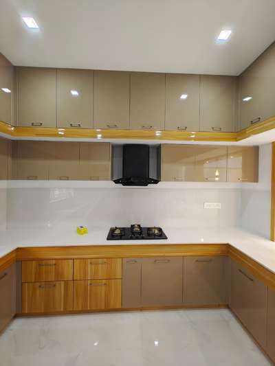 *Modular Kitchen*
Kitchen Cabinets . Plywood + Mica laminate ( mechine press )