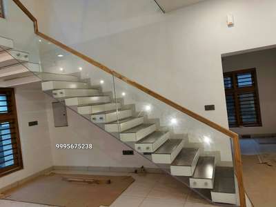 ##wooden handrail #toughned glass work #StaircaseDesigns 
 #glass handrail  #handrail work