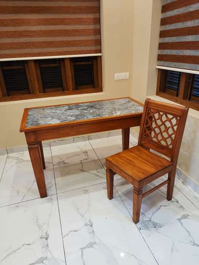 Treated mahagony coffee table used with tile on table top, marasala interiors and architects