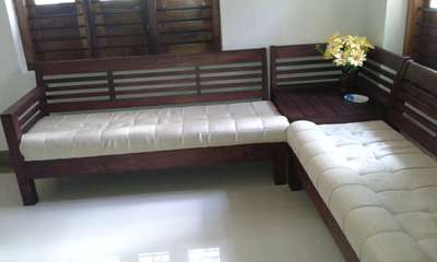 corner sofa with eetty wood