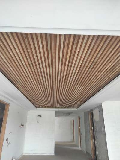 wood strips ceiling design. work in progress.. 
contact us for enquiry:-
Mobile no. - 9711143393
Email.  - info@aestheticdesign.co.in