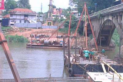 Marine piling with barge at Chengannur
