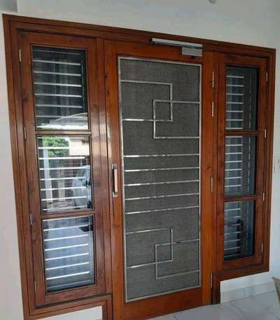 hello everyone welcome to home art interior 
woodworking febrication and painting contact 8449774758 8394086714 #Woodendoor #doors #maindoordesign