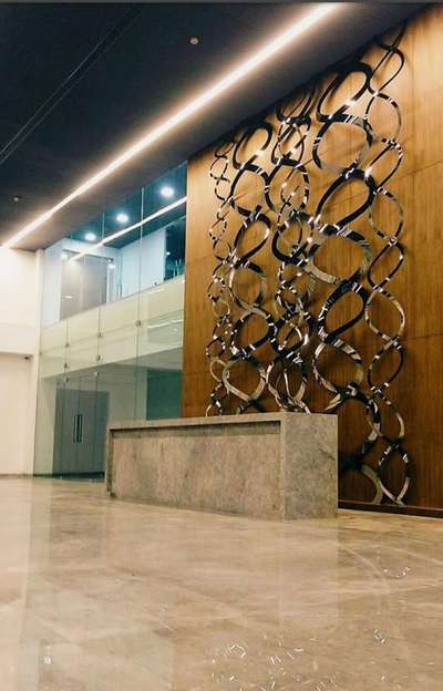 Laser cut metal art Concept SS with titanium coat for a IT company reception area.