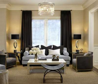 Get this luxury look by teaming beige with black, white and metallic colours. Go for two layered curtains in black and white, have your sofa with black and white cushions, metallic table decor, a rattan dhurrie and top it with a crystal chandelier. Also don't forget to add white flowers for softness.
#interior #decor #ideas #home #interiordesign #indian #colourful #decorshopping