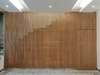 Staircase Wooden Partition  #wooden Planks  #FalseCeiling  #BedroomCeilingDesign  #lightcolour  #woodenpaneling