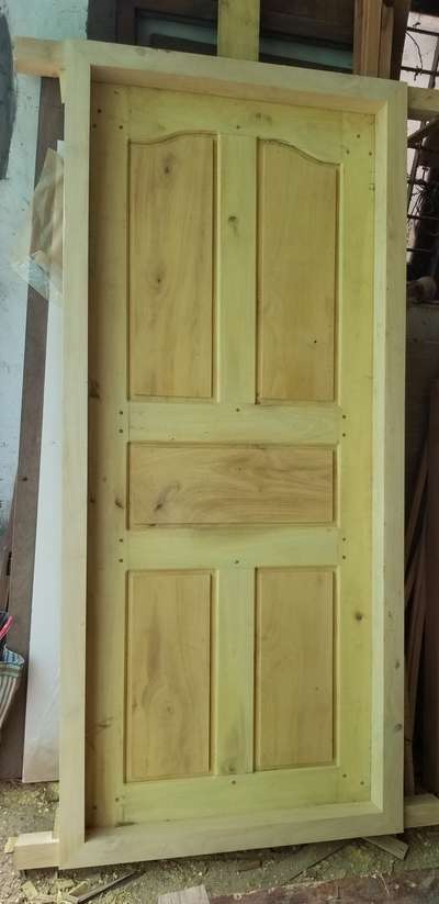 Jackwood door with Anjili frame 
#thondutharayilfurnituremart #karukachal #maindoor  #Woodendoor  #windowsanddoors