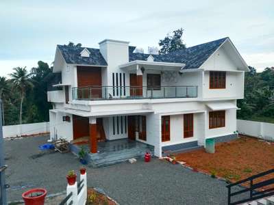 finished@Athikkattukulangara, Nooranad, Alappuzha(district)

client. Mr. Shihab
Area : 2650 sqft
4BHK
 #KeralaStyleHouse
 #keralastyle
#ElevationHome
 #architecturedesigns