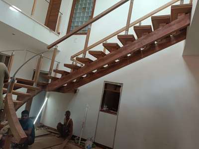 ongoing work Ms with wood stair