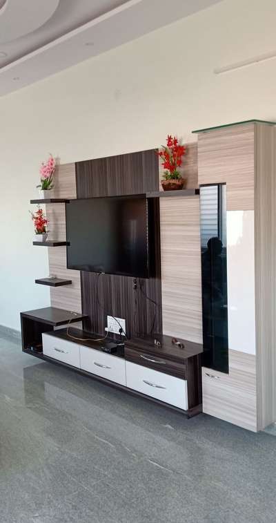 tv unit 
for more contact us 
 #thedecorators  #HouseDesigns  #BedroomDecor  #MasterBedroom  #TVStand  #modularTvunits  #tvunitinterior