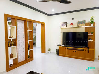 living room interior design
site:puthupallly
client name :Mr jossy
material used :710 marine plywood  #KeralaStyleHouse #keralainterior  #keralainteriordesign #hestiainteriors  #LivingroomDesigns  #tvunitdesign