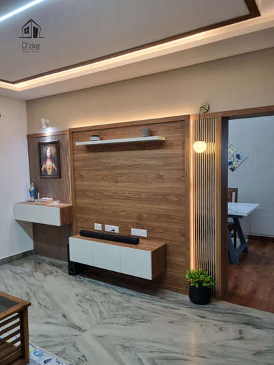 interior 
.
.
Client details : 
.
.
Location: kollam
.
.
Designed by : @dzire_design_studio 
 #KeralaStyleHouse #keralastyle #keralaplanners #MrHomeKerala #keralahome#renovation
#HouseDesigns #LivingroomDesigns #LivingRoomSofa #LivingroomTexturePainting #WALL_PANELLING #homerenovation #Carpenter #tvunits #Prayerunit #InteriorDesigner #carporch  #HouseRenovation