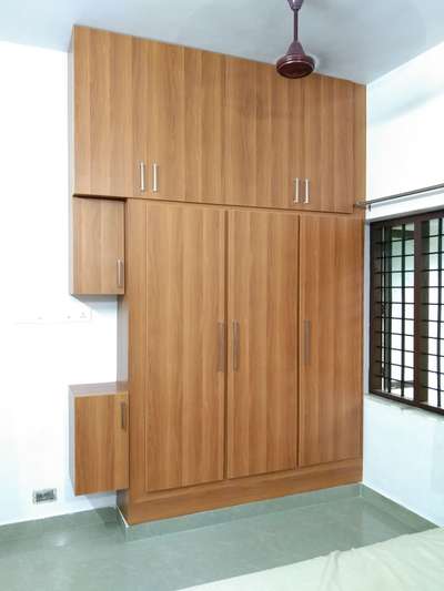 Wardrobe On Ferro cement structure :

Material : WPC + Lamination 
Location : Ollur, Thrissur 
Client : Manoj & Dr. Renuka Manoj