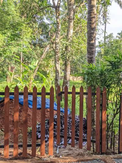 Custom Wood Fence install

features hpl wooden pickets over steel frame, This fence has the beauty of the wood with strength of steel