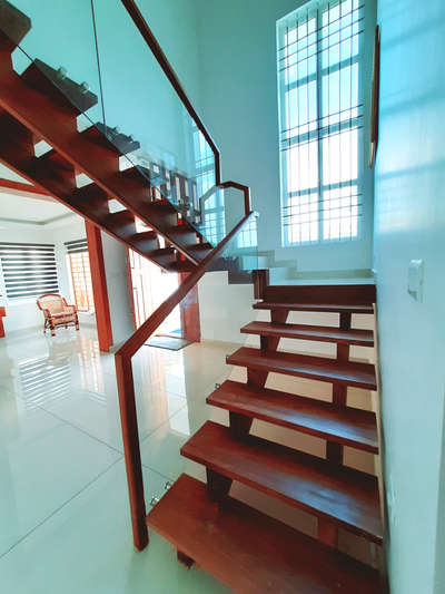 wooden stair with Teflon glass...... #InteriorDesigner #WoodenStaircase #beautifulhouse #nicedesigns