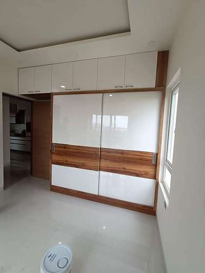 wardrobe design with loft 
and contact us for interior work in Kerala 9084583730  #KeralaStyleHouse  #popularbuildersincochin  #4DoorWardrobe