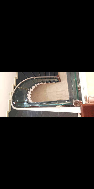 bend stair bend glass wood & steel leg  finishing 
#glassworks #Glassinterior #GlassStaircase #GlassHandRailStaircase #KeralaStyleHouse