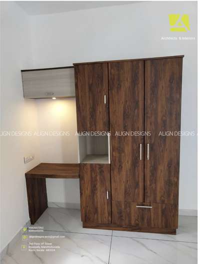 Completed Wardrobe
ALIGN DESIGNS 
Architects & Interiors
2nd floor,VF Tower
Edapally,Marottichuvadu
Kochi, Kerala - 682024
Phone: 9562657062