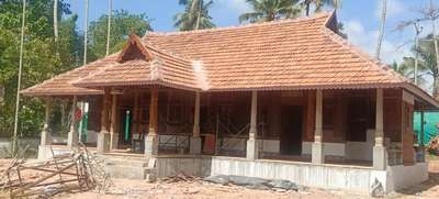 #TraditionalHouse  #kerala_homestyle  #homestay  #homestayvilla  #ElevationHome  #TraditionalHouse  #keralastyle  #pillerdesign  #2BHKHouse  #35LakhHouse  #WoodenCeiling  #SlopingRoofHouse  #ClayRoofTiles  #stonepiller  #woodnpiller